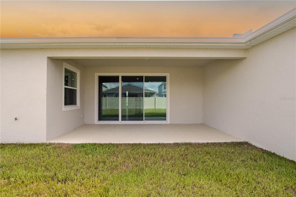 32183 Conchshell Sail Street Wesley Chapel, FL 33545 - Photo 2 of 45 a view of an empty room and window