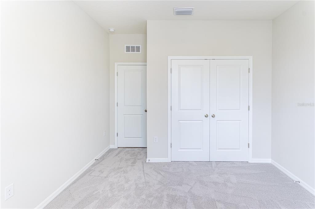 32183 Conchshell Sail Street Wesley Chapel, FL 33545 - Photo 29 of 45 a view of an empty room