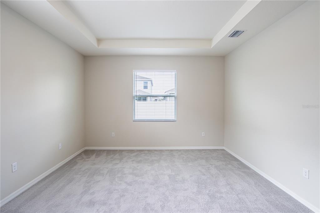 32183 Conchshell Sail Street Wesley Chapel, FL 33545 - Photo 3 of 45 an empty room with a window