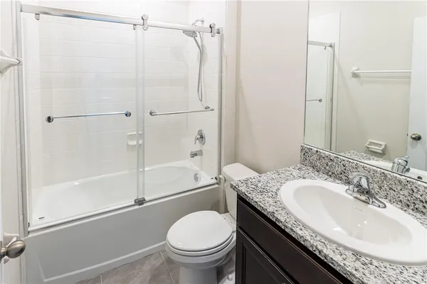 a view of storage and utility room with washer and dryer
