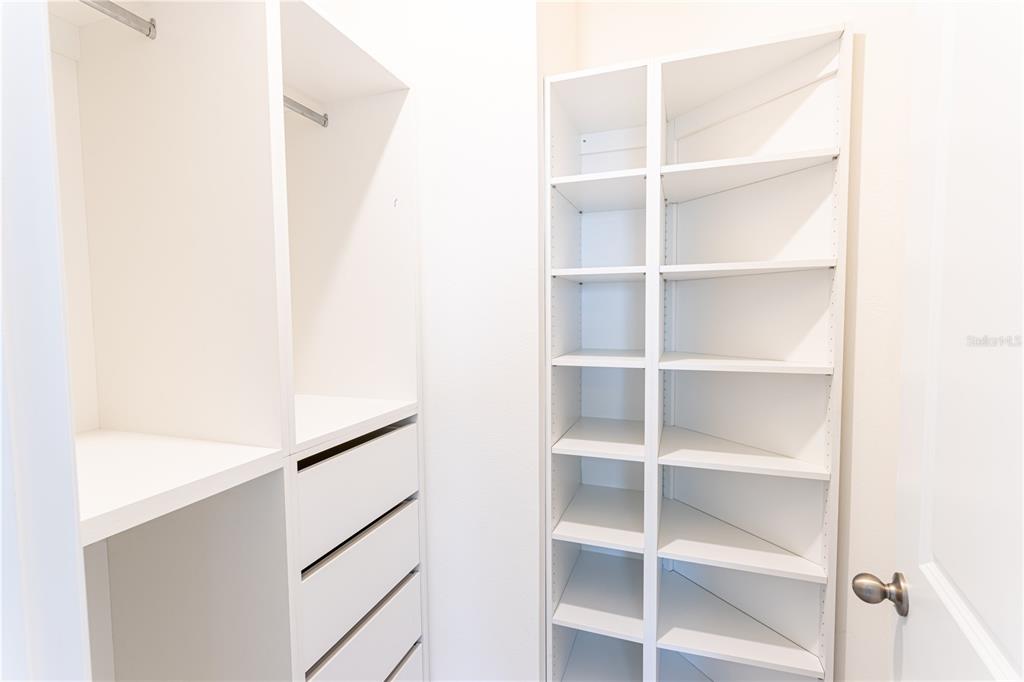 32183 Conchshell Sail Street Wesley Chapel, FL 33545 - Photo 4 of 45 a view of a room with rack on the wall