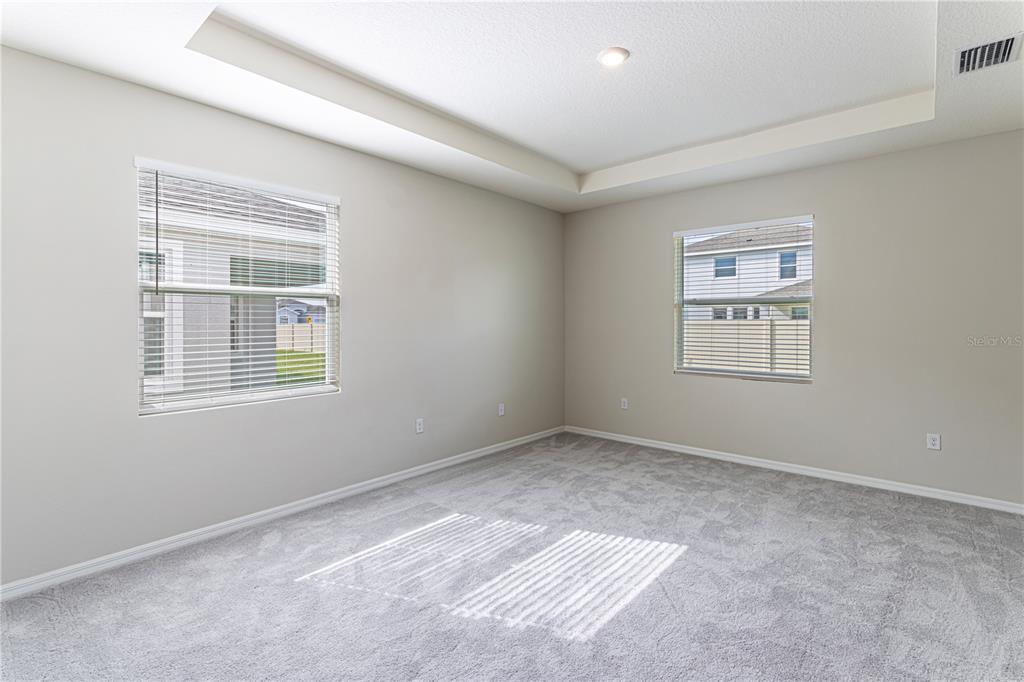 32183 Conchshell Sail Street Wesley Chapel, FL 33545 - Photo 41 of 45 a view of an empty room with a window