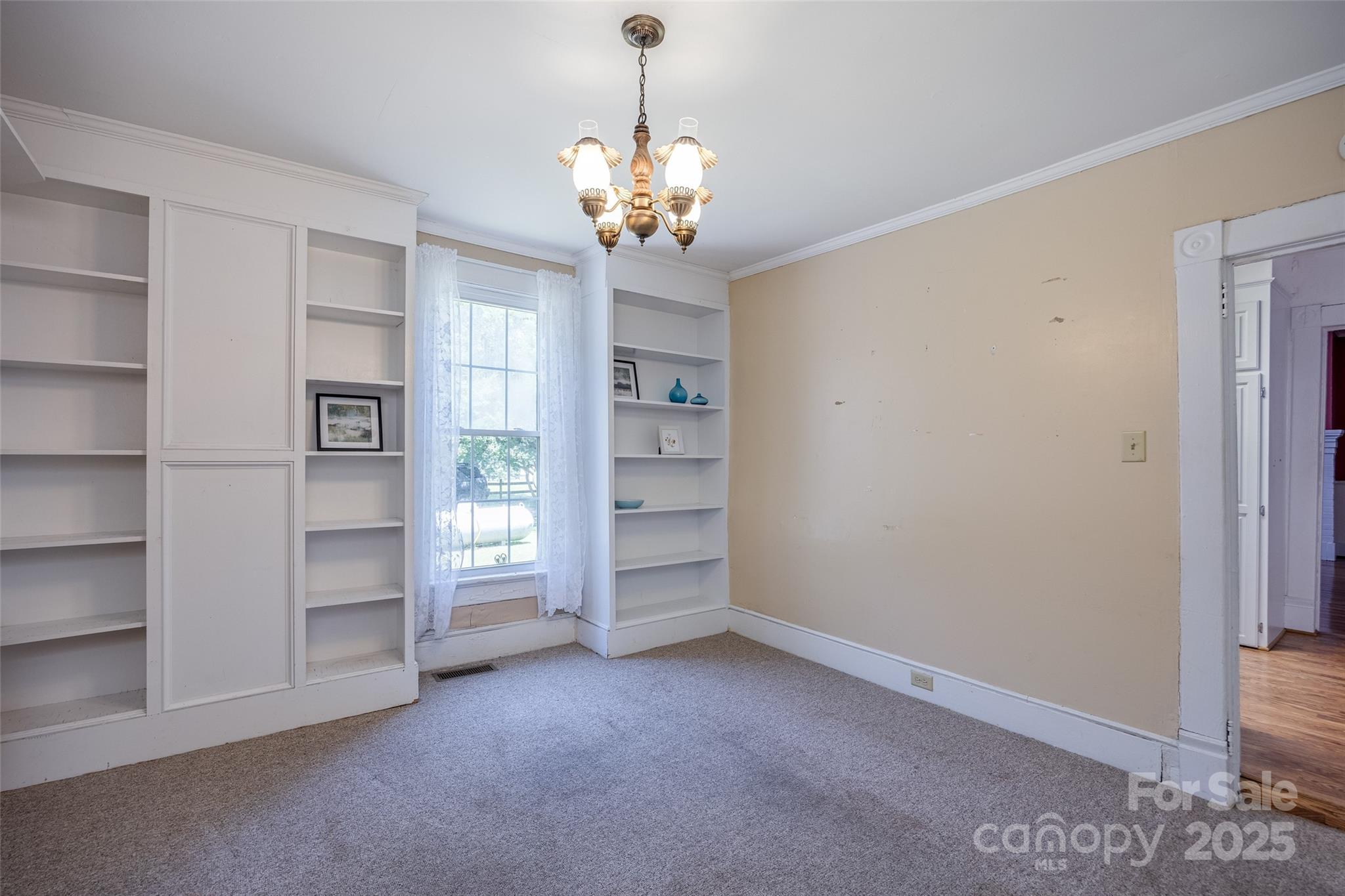 274 Old Harden Road Winnsboro, SC 29180 - Photo 15 of 39 a view of an empty room with a cabinet and a window
