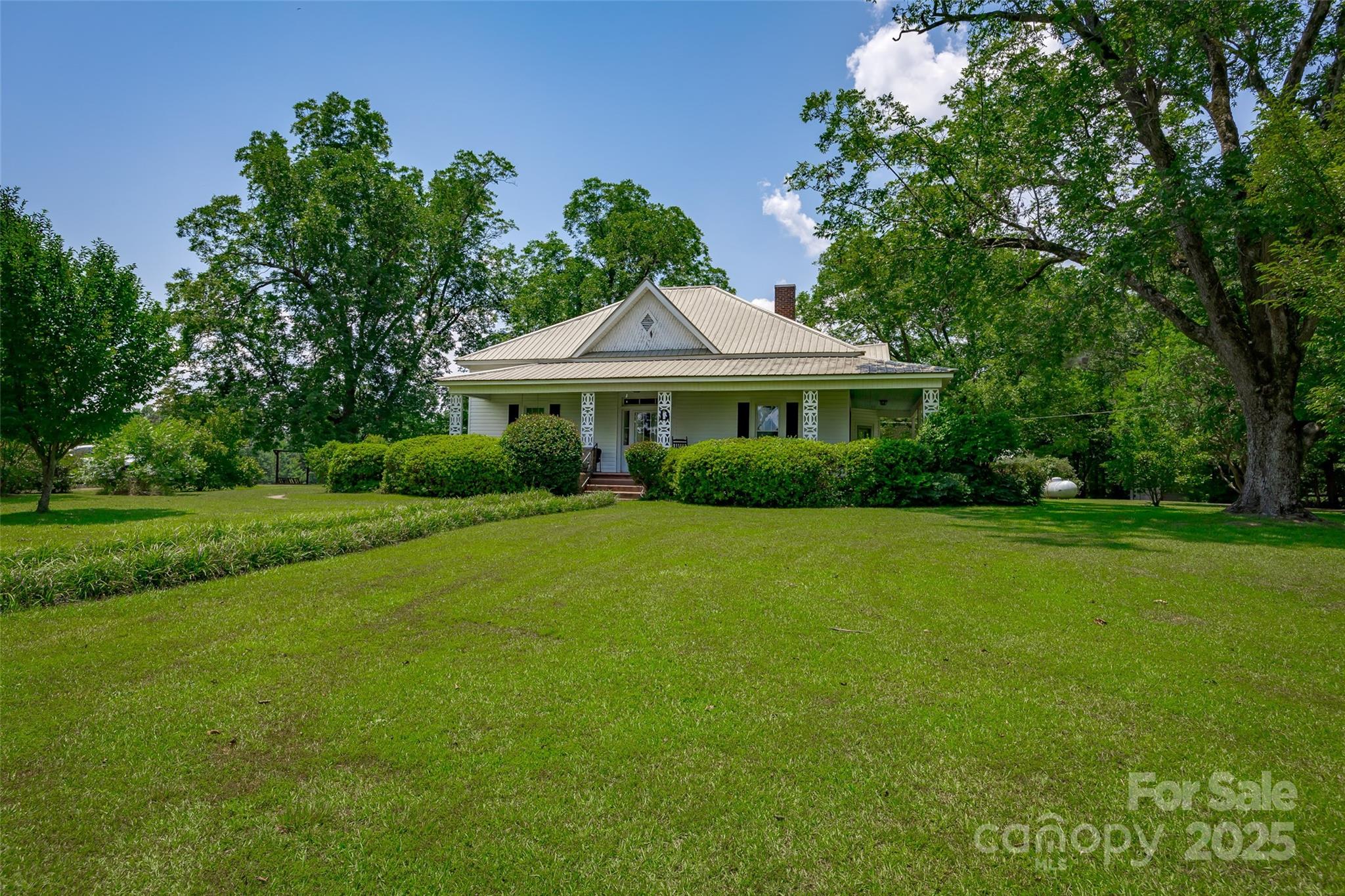 274 Old Harden Road Winnsboro, SC 29180 - Photo 2 of 39 a front view of a house with a yard