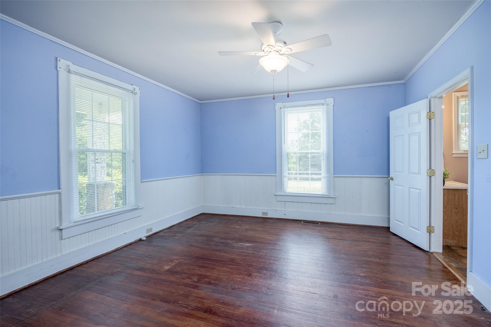274 Old Harden Road Winnsboro, SC 29180 - Photo 21 of 39 a view of an empty room with wooden floor and a window