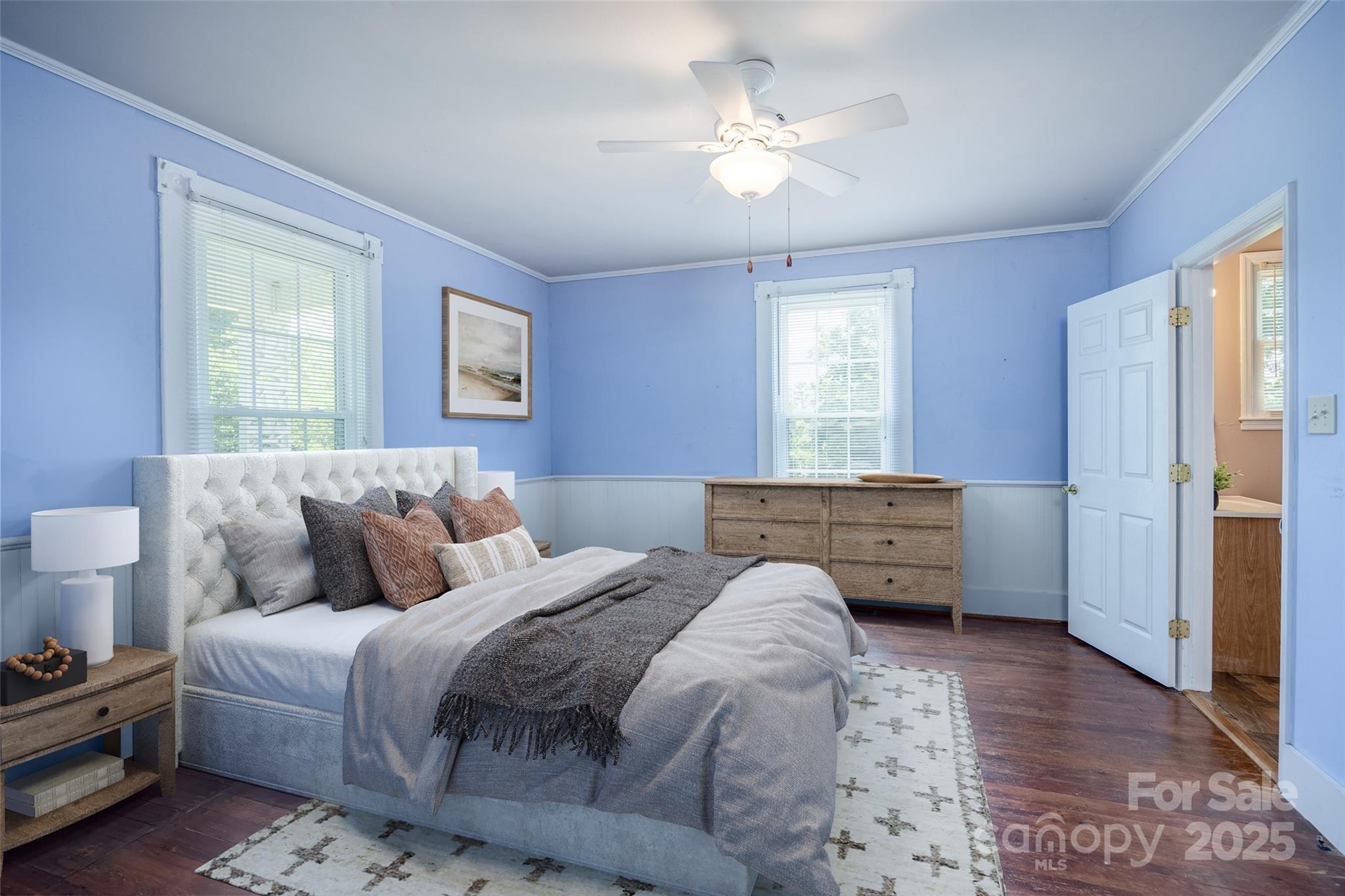 274 Old Harden Road Winnsboro, SC 29180 - Photo 22 of 39 a bedroom with a bed and a chandelier