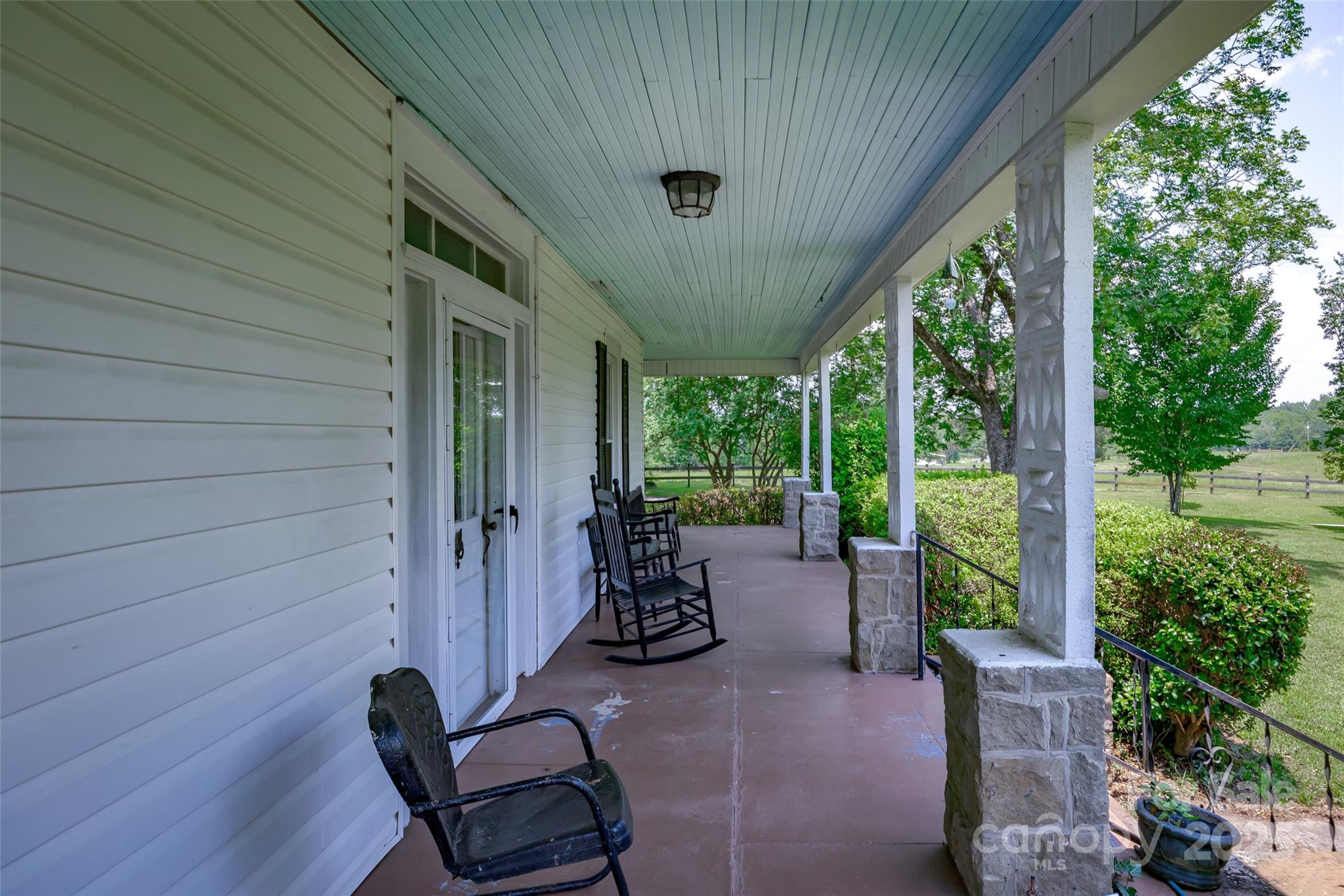 274 Old Harden Road Winnsboro, SC 29180 - Photo 26 of 39 a porch with chairs and garden