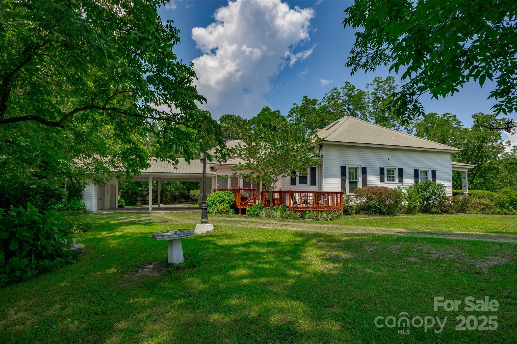 274 Old Harden Road Winnsboro, SC 29180 - Photo 30 of 39 a front view of a house with a yard and trees
