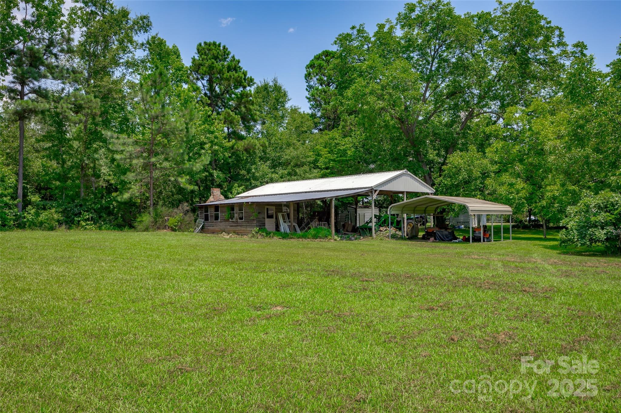 274 Old Harden Road Winnsboro, SC 29180 - Photo 31 of 39 a view of a house with a yard