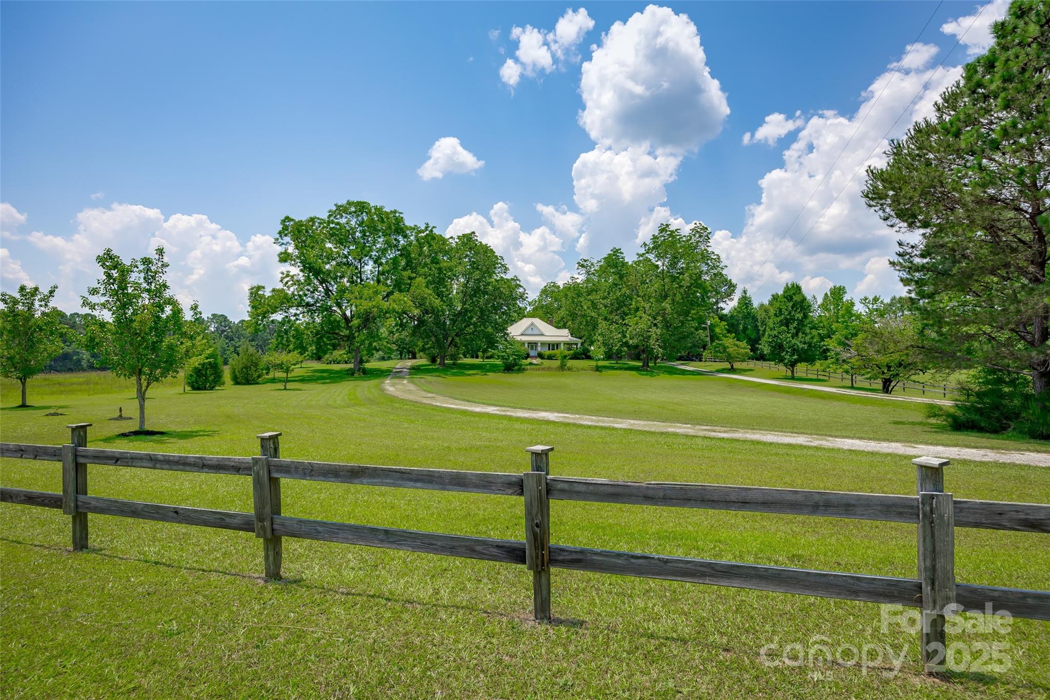 274 Old Harden Road Winnsboro, SC 29180 - Photo 36 of 39 a view of a golf course with a lake