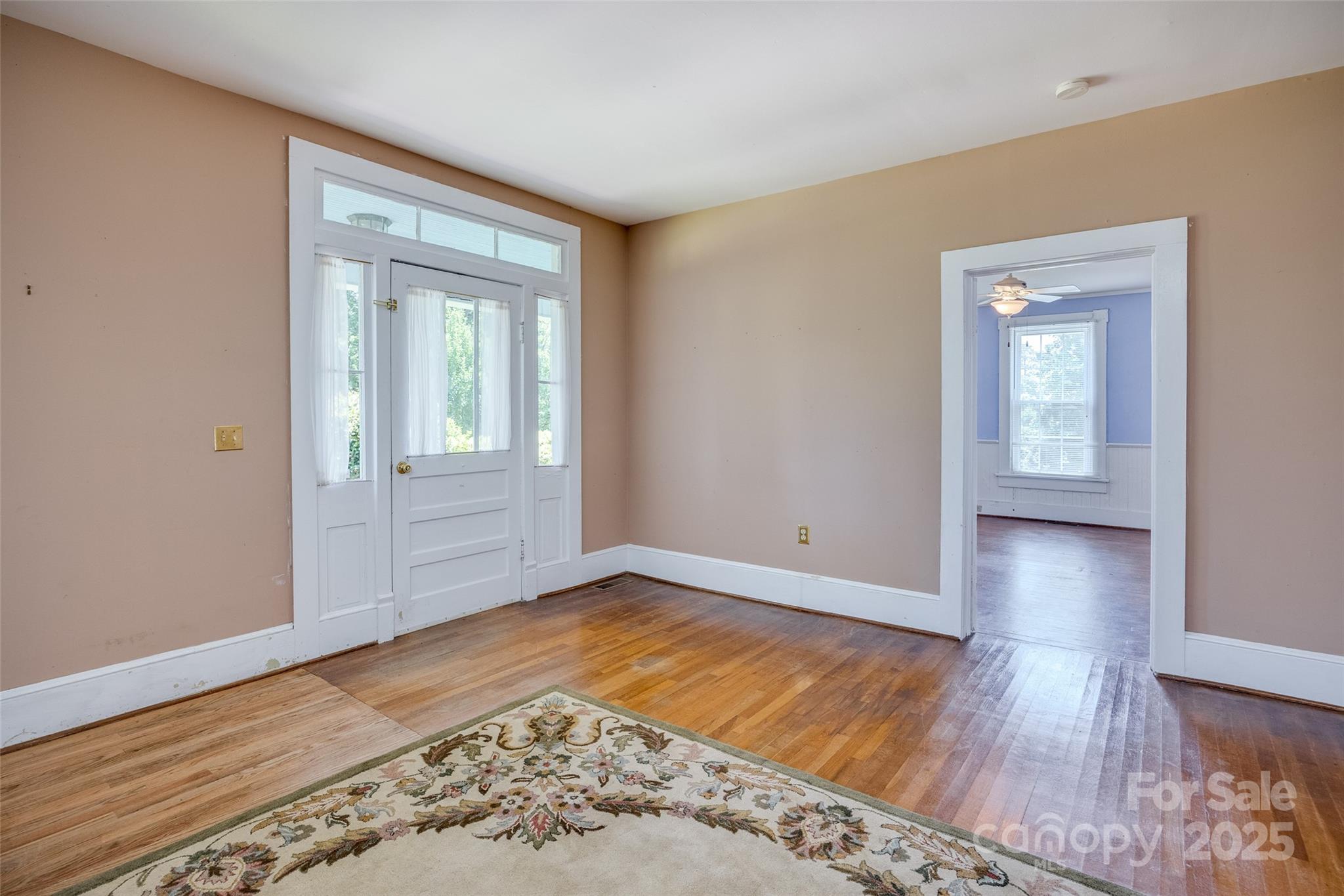 274 Old Harden Road Winnsboro, SC 29180 - Photo 7 of 39 a view of an empty room with wooden floor and a window