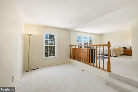 a view of livingroom with furniture and windows