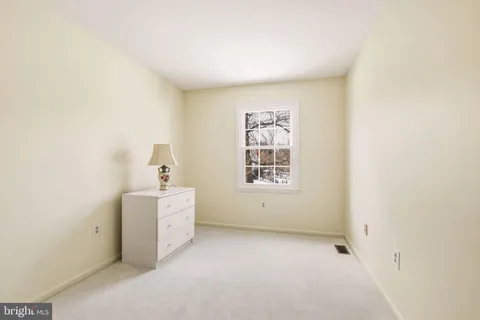 a view of utility room with windows