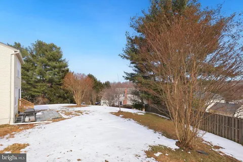a view of snow on the side of road