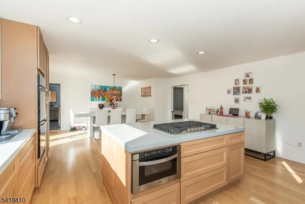 a kitchen with a stove and cabinets