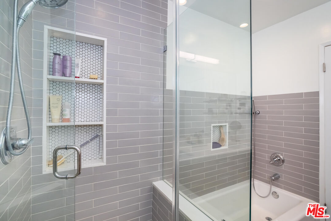 1221 North Kings Road, Unit 208 West Hollywood, CA 90069 - Photo 16 of 25 a bathroom with a shower