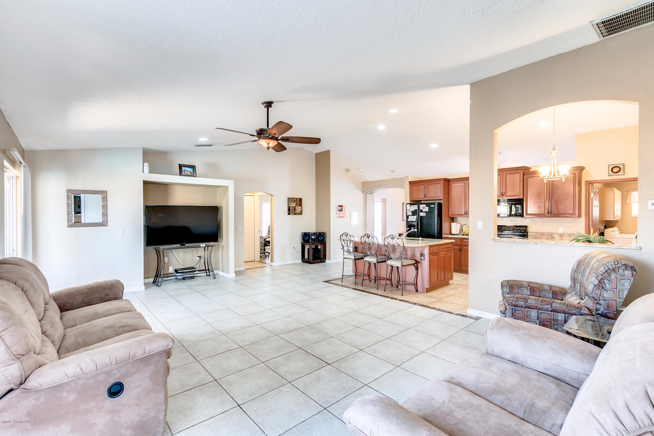 129 Donna Road Palm Bay, FL 32907 - Photo 13 of 36 Looking from Master BR through Family Rm