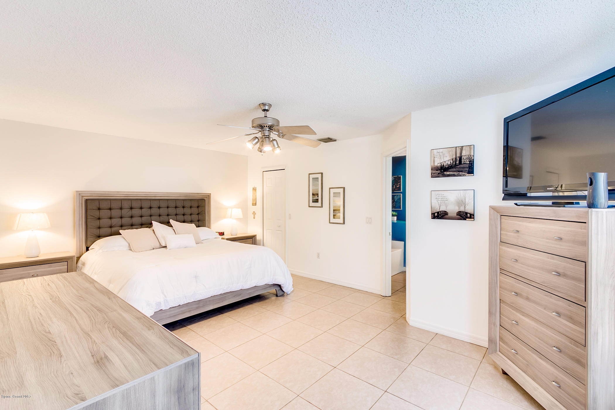 129 Donna Road Palm Bay, FL 32907 - Photo 14 of 36 Master Bedroom w/Walk-in closet