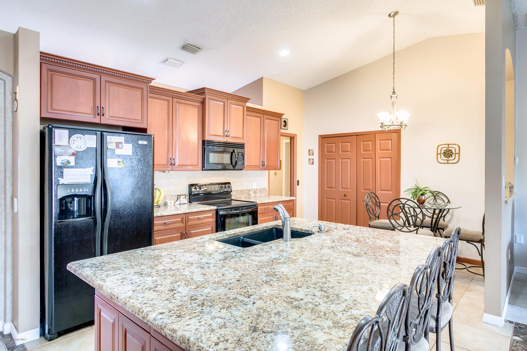 129 Donna Road Palm Bay, FL 32907 - Photo 6 of 36 Rich Wood Cabinets
