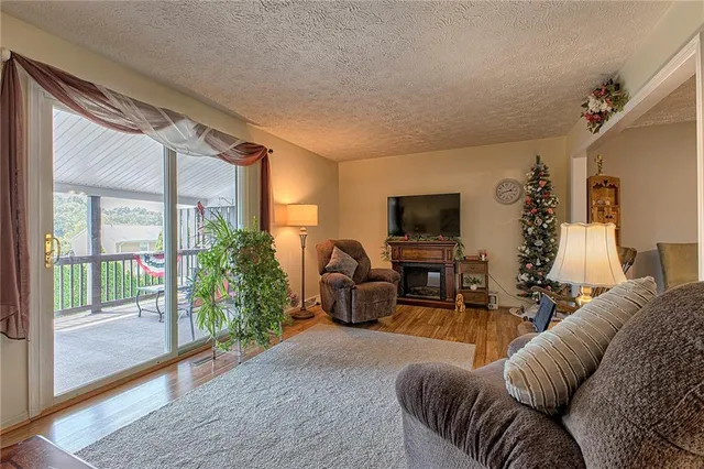 a living room with furniture or couch and a flat screen tv