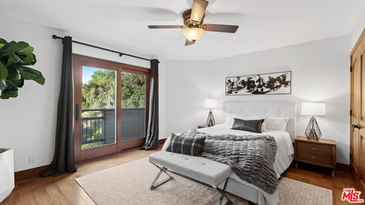 4117 Vanetta Place Studio City, CA 91604 - Photo 13 of 21 a bedroom with a bed dresser and a window