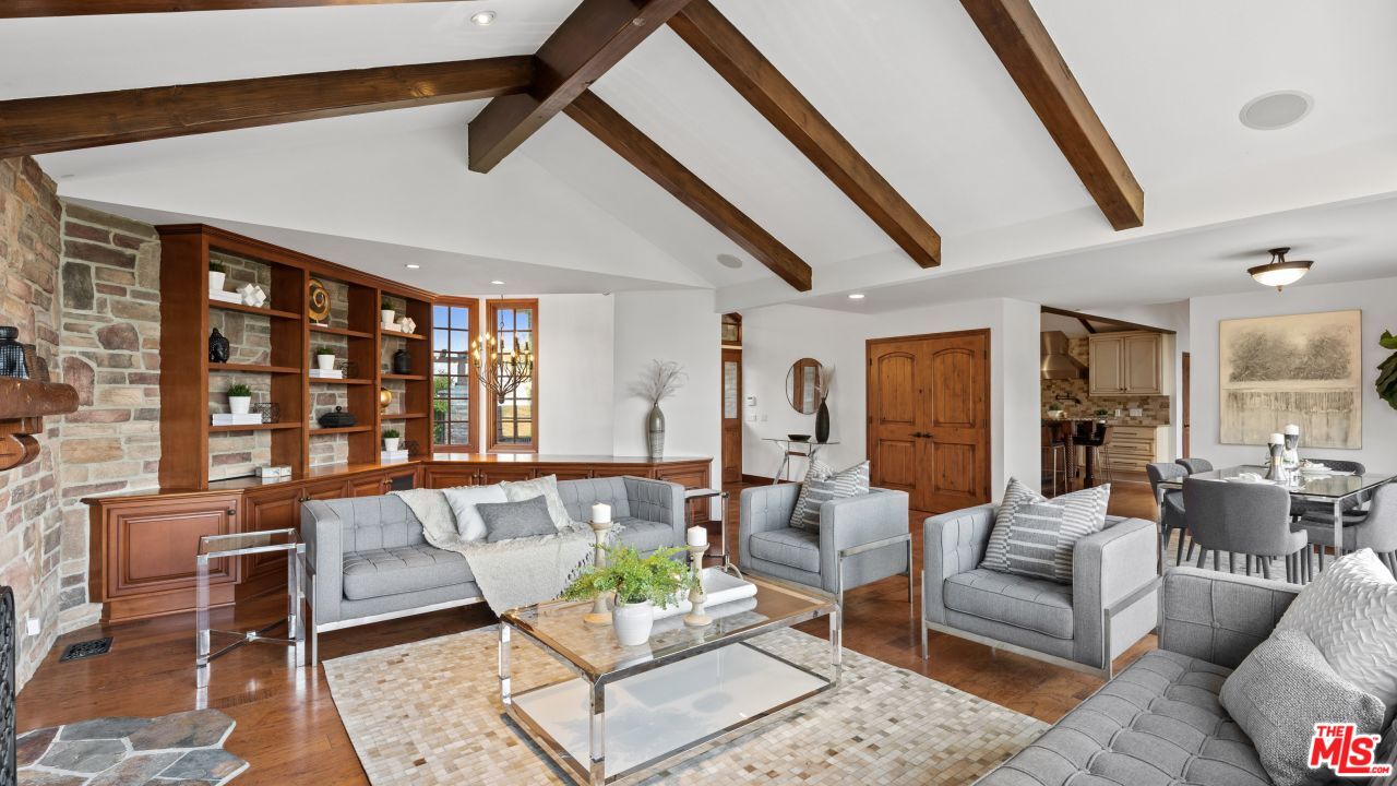 4117 Vanetta Place Studio City, CA 91604 - Photo 2 of 21 a living room with furniture and a large window
