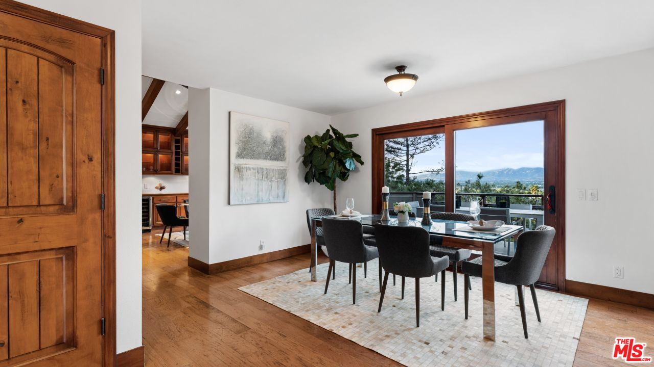 4117 Vanetta Place Studio City, CA 91604 - Photo 3 of 21 a view of a dining room with furniture window and wooden floor