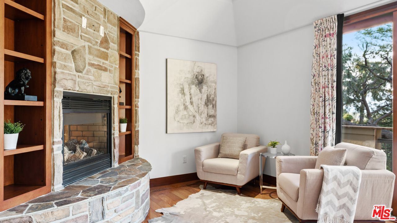 4117 Vanetta Place Studio City, CA 91604 - Photo 9 of 21 a living room with furniture and a window