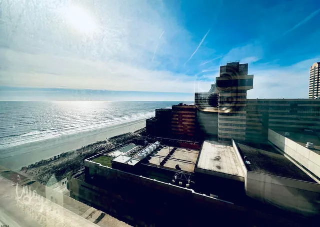 a view of a balcony with wooden floor