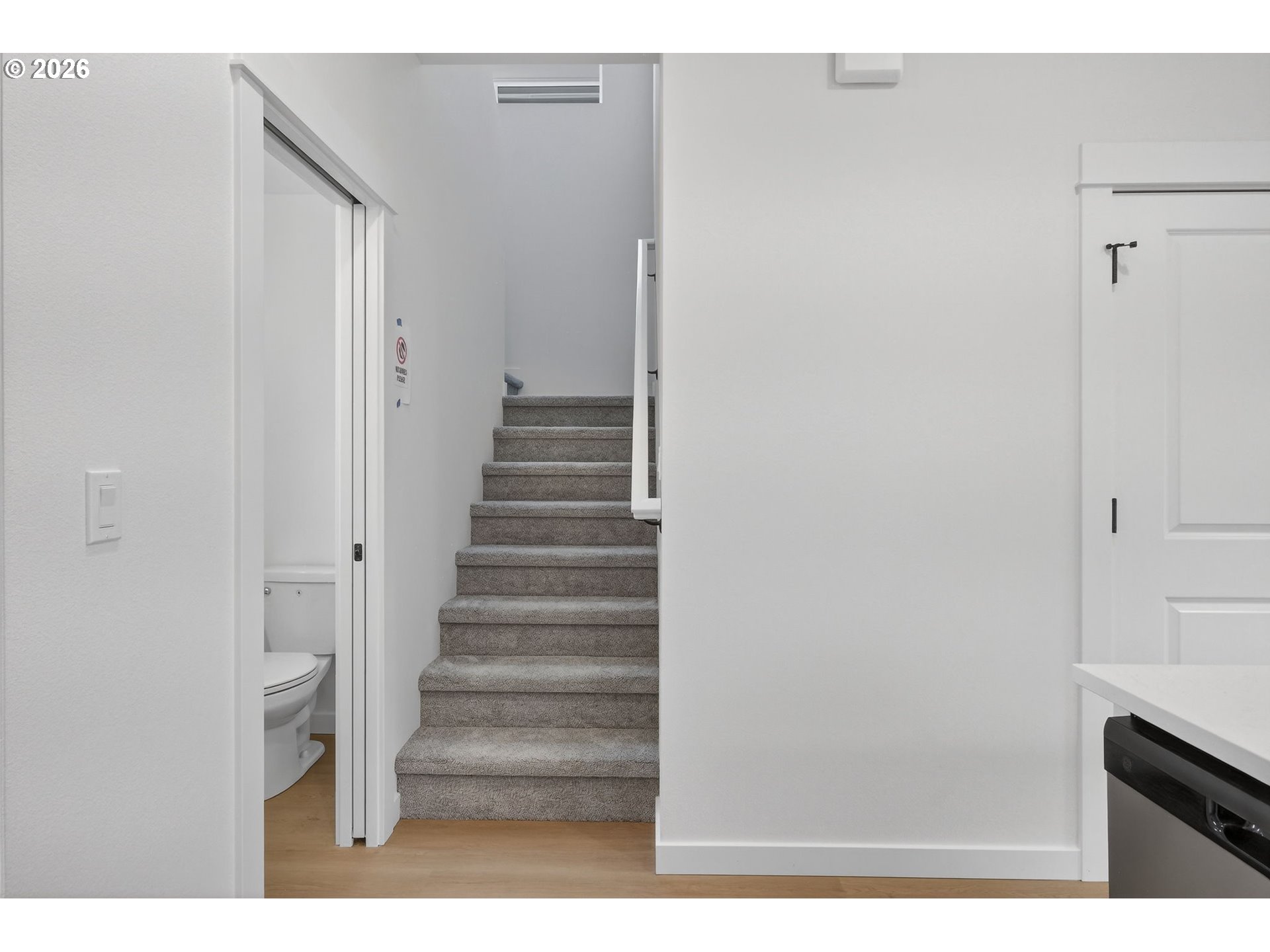 4059 Southwest McKinley Street, Unit 40 Gresham, OR 97080 - Photo 23 of 39 a view of entryway with wooden floor
