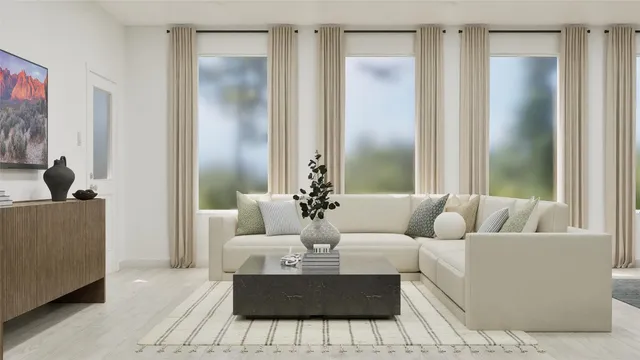 a living room with furniture and a large mirror