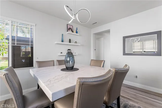 a view of a dining room with furniture