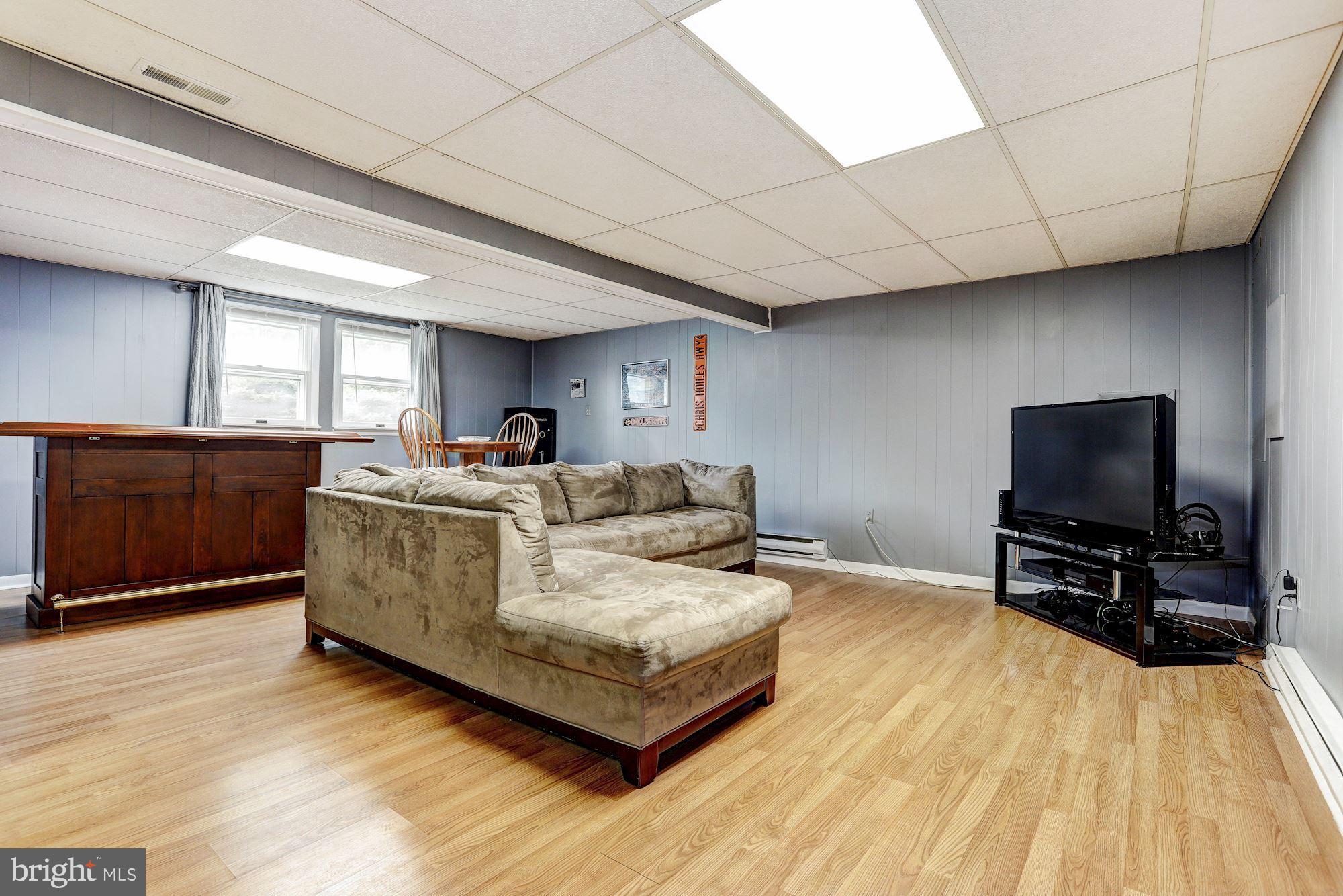 2651 Sandymount Road Finksburg, MD 21048 - Photo 22 of 30 a living room with furniture and a flat screen tv