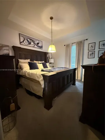 a living room with furniture and window