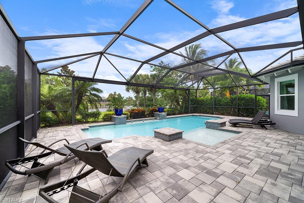 5154 Andros Drive Naples, FL 34113 - Photo 4 of 46 a view of swimming pool with outdoor seating