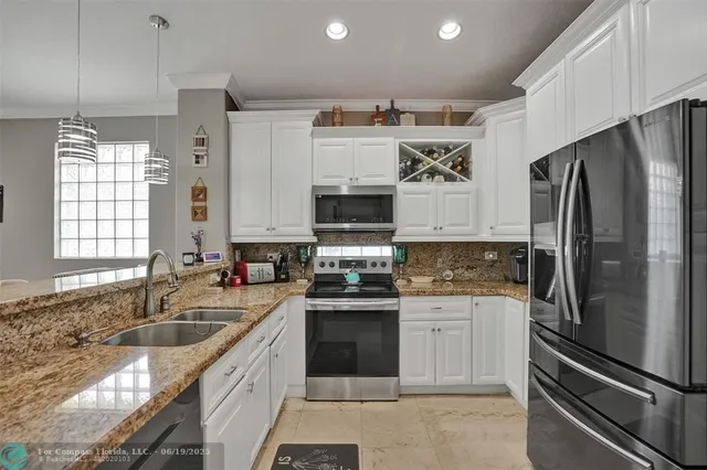 $649,999 | 5445 Northwest 122nd Drive, Coral Springs, FL 33076