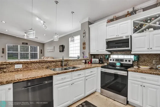 $649,999 | 5445 Northwest 122nd Drive, Coral Springs, FL 33076