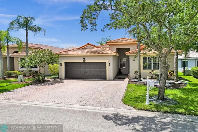 $649,999 | 5445 Northwest 122nd Drive, Coral Springs, FL 33076