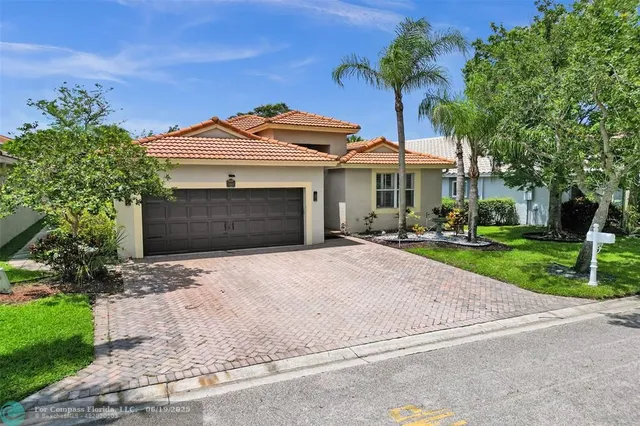 $649,999 | 5445 Northwest 122nd Drive, Coral Springs, FL 33076