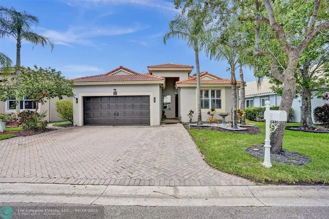 $649,999 | 5445 Northwest 122nd Drive, Coral Springs, FL 33076