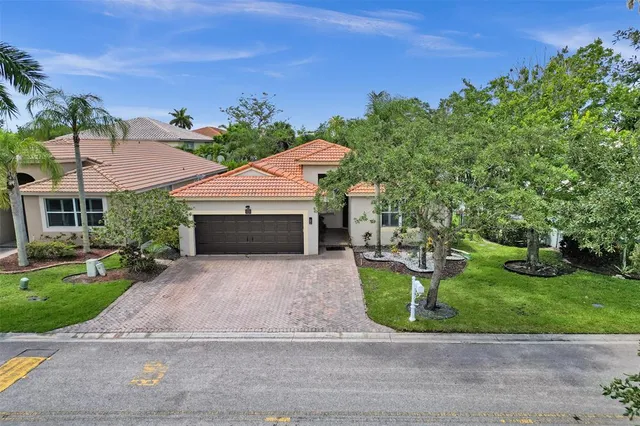 $649,999 | 5445 Northwest 122nd Drive, Coral Springs, FL 33076