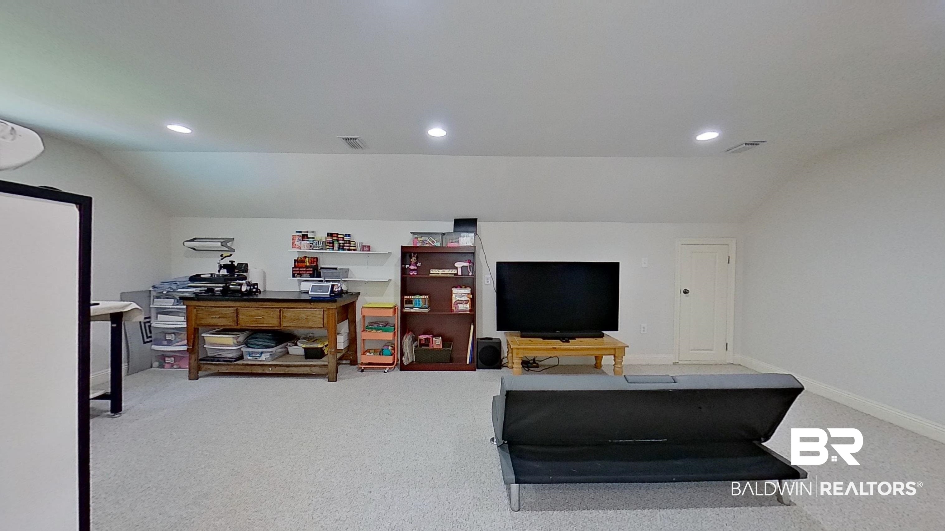4340 Hamilton Oaks Lane Mobile, AL 36695 - Photo 33 of 51 Carpeted living room with lofted ceiling