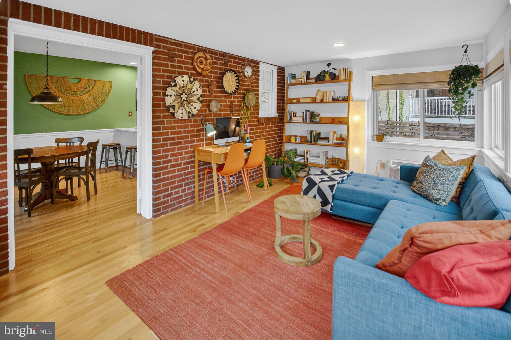 3015 Legation Street Northwest Washington, DC 20015 - Photo 10 of 23 Family room with walls of windows