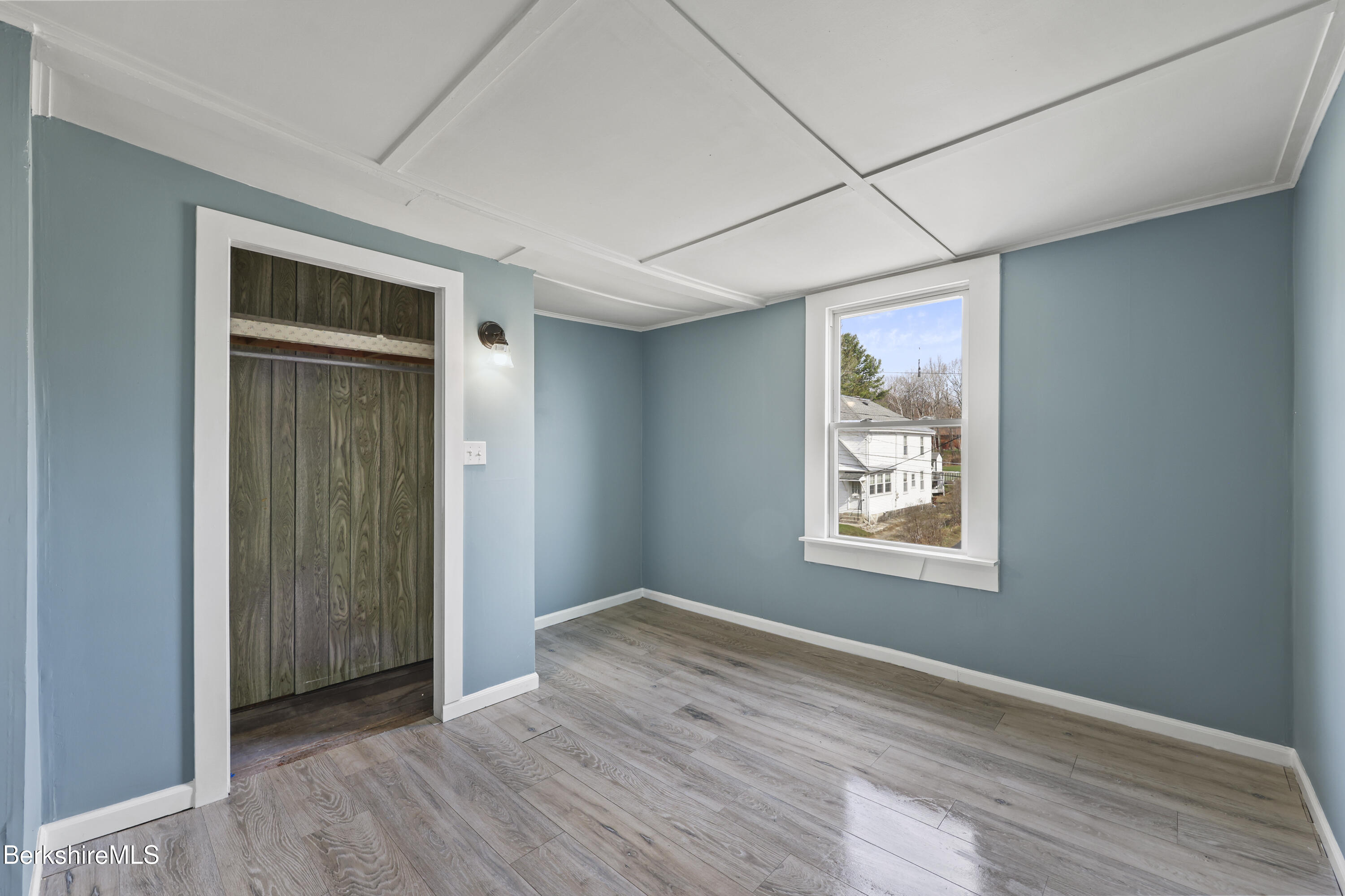 49 McArthur Street Pittsfield, MA 01201 - Photo 17 of 33 an empty room with windows and closet