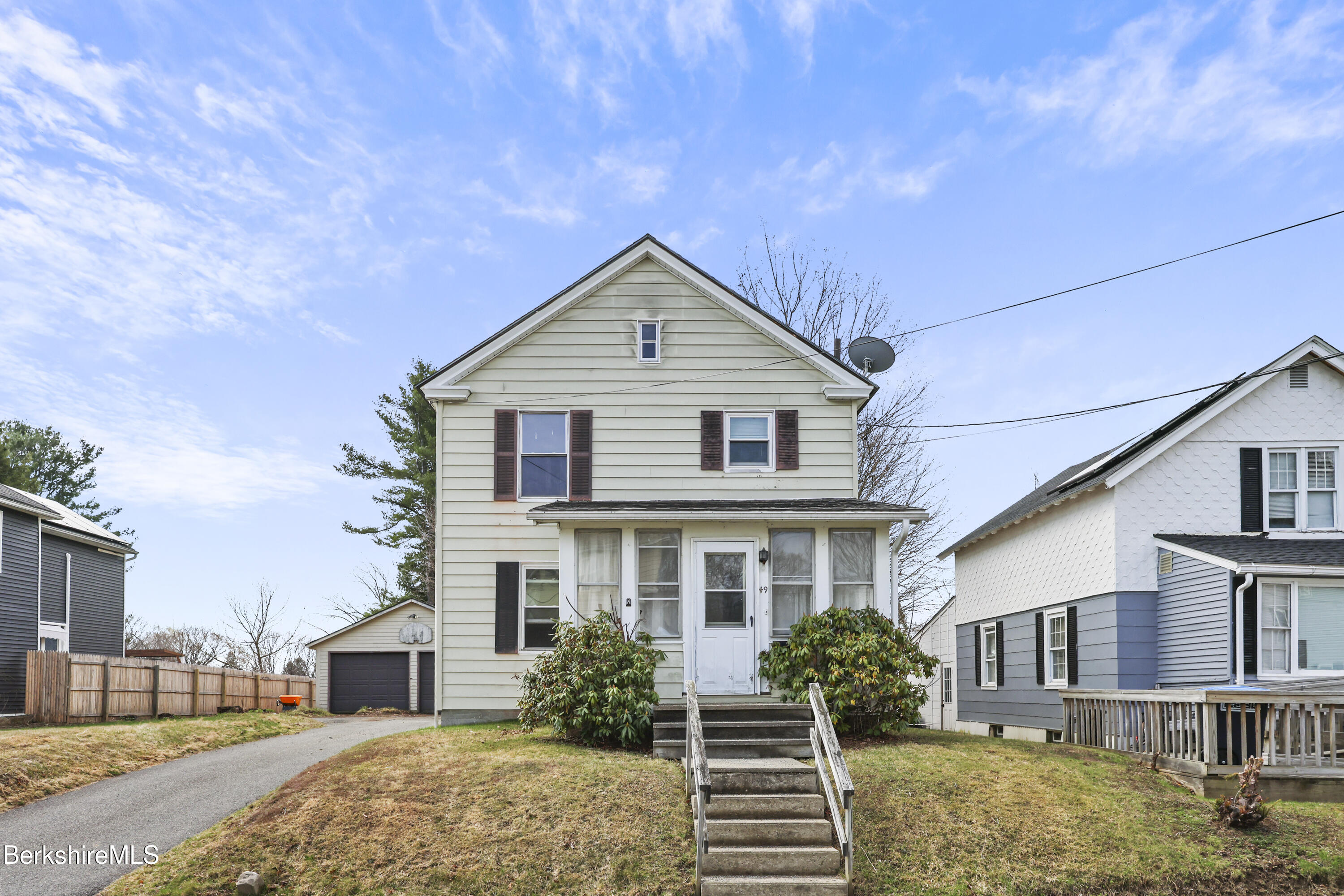 49 McArthur Street Pittsfield, MA 01201 - Photo 2 of 33 a house view with a garden space
