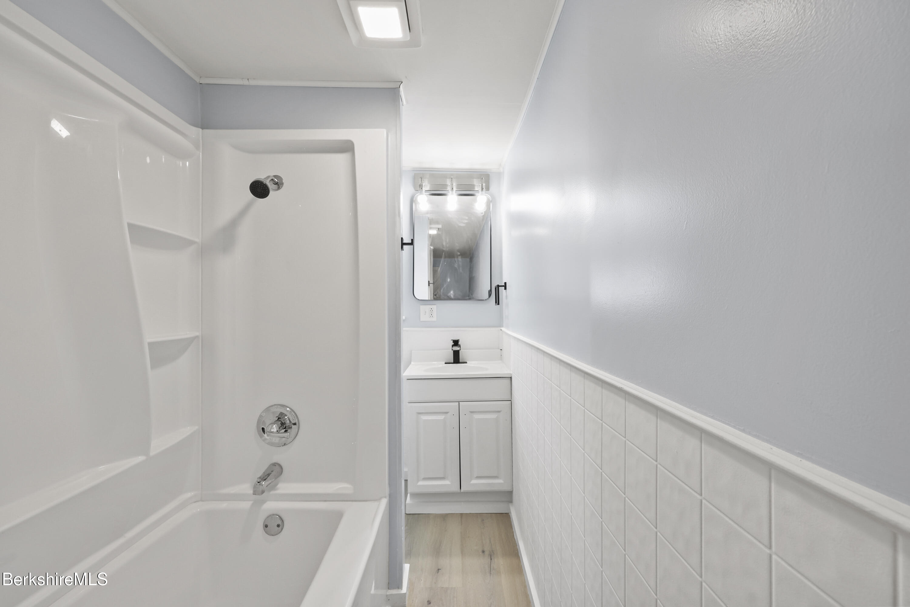 49 McArthur Street Pittsfield, MA 01201 - Photo 24 of 33 a bathroom with a bathtub and a sink