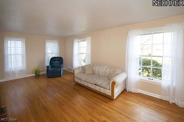 1656 Rushton Road Cleveland, OH 44121 - Photo 4 of 20 Lots of natural light in living room