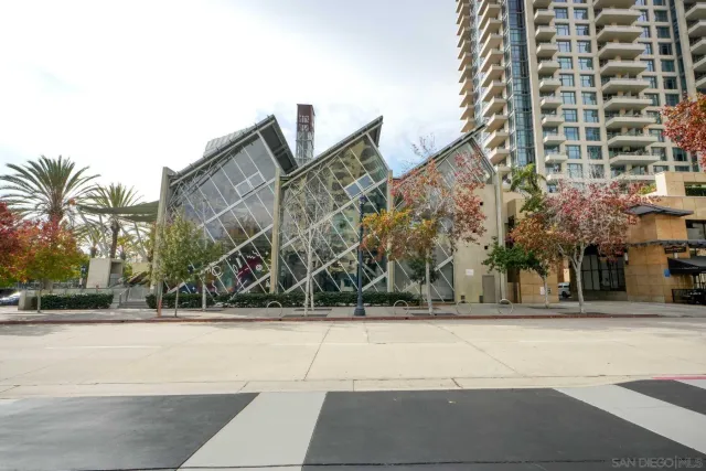 a view of a city street from a balcony
