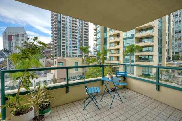 a view of a chairs and table in patio