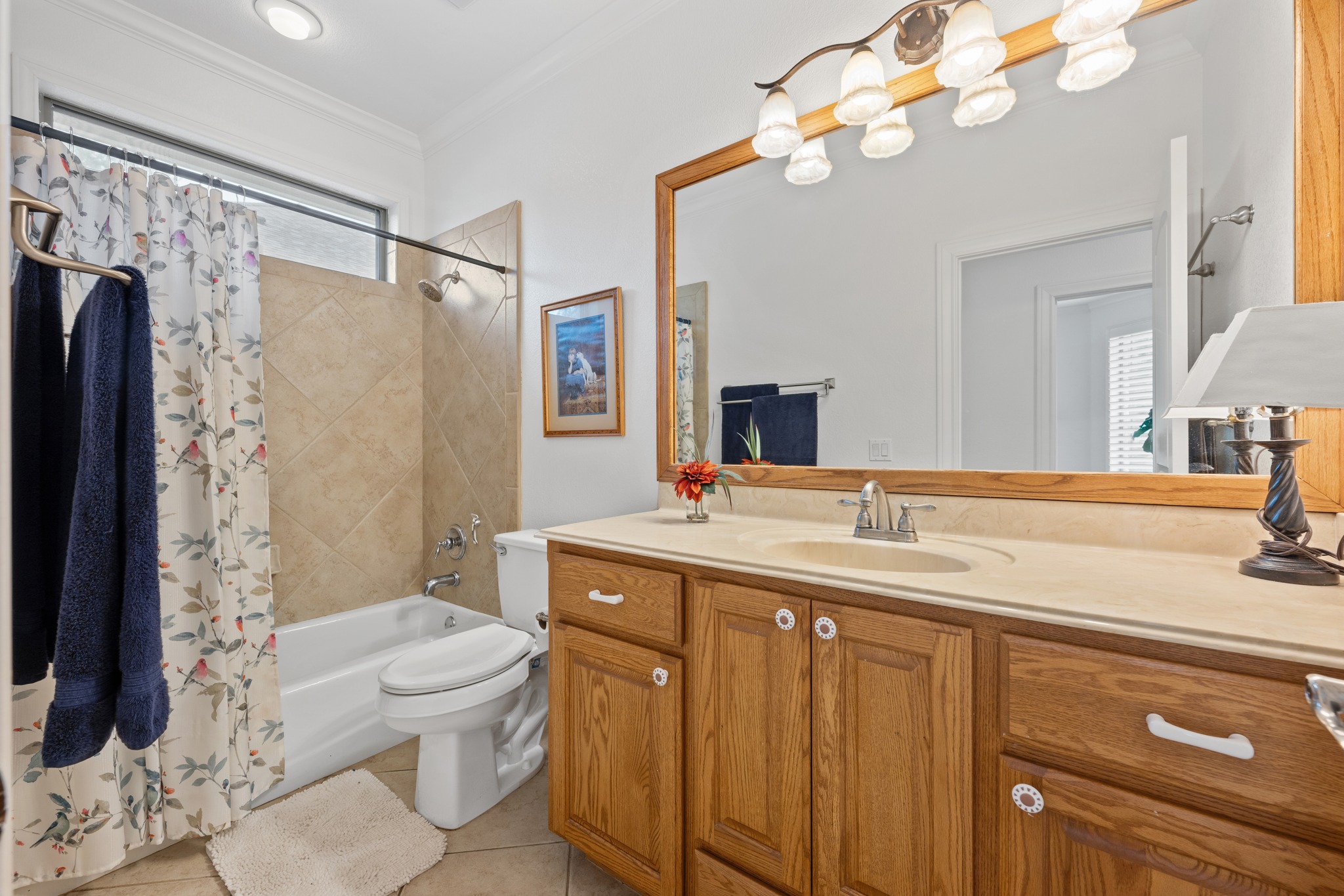 815 River Walk Trail Georgetown, TX 78633 - Photo 24 of 36 The secondary full bathroom is conveniently located across the hall from the second bedroom and features the same thoughtful finishes found throughout the home